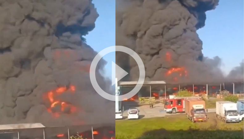 Incendio consume almacén en China