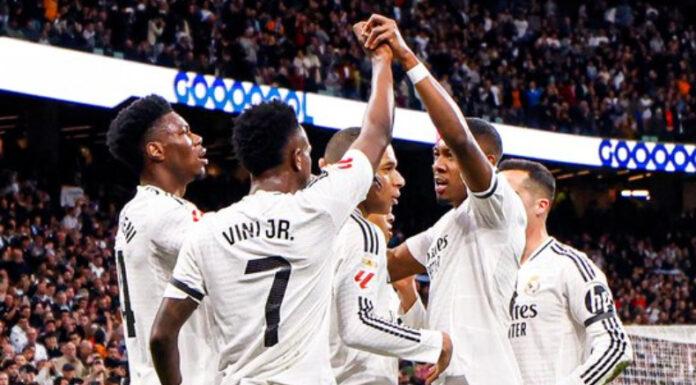 Real Madrid derrotó al Rayo Vallecano y con un partido más alcanzó al Barcelona en la cima del campeonato español.