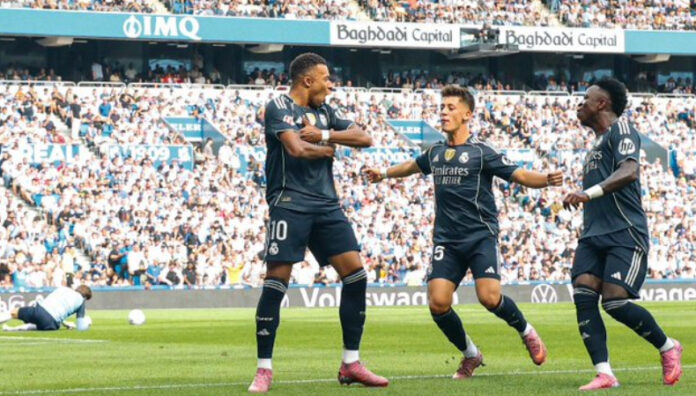 Real Madrid sufre para vencer a la Real Sociedad Real Madrid se impuso de visitante a la Real Sociedad y mantiene el paso perfecto en el campeonato español.